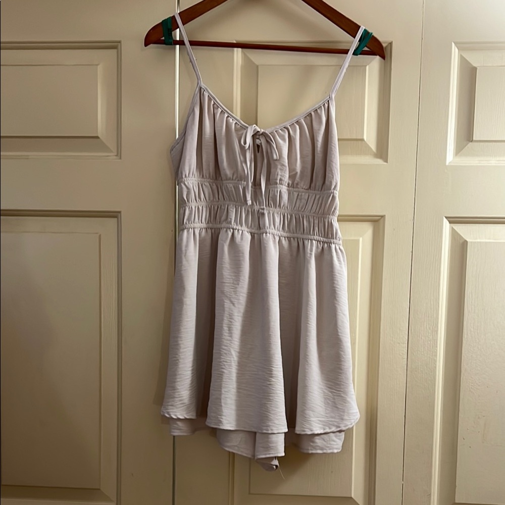 No Boundaries Light Beige Spaghetti-Strap Romper Gathered top, skirt over shorts